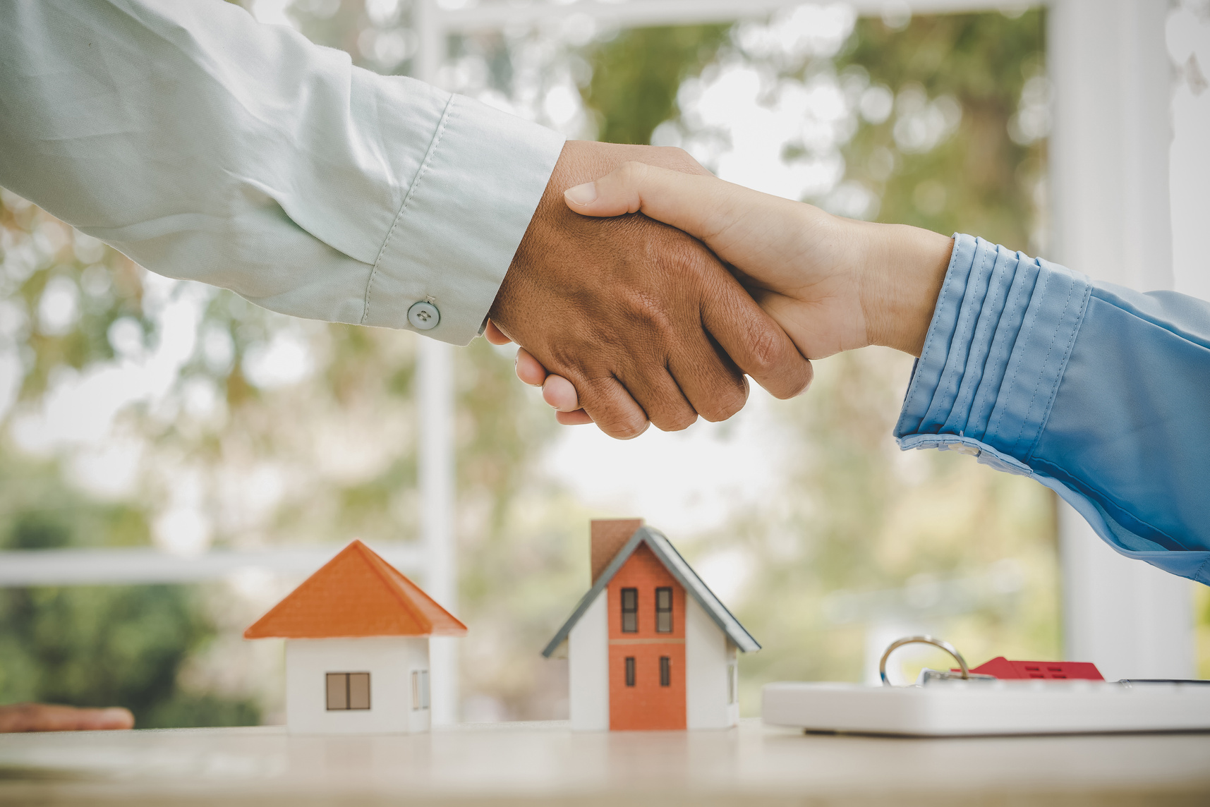 Agent and Client Discussing Property